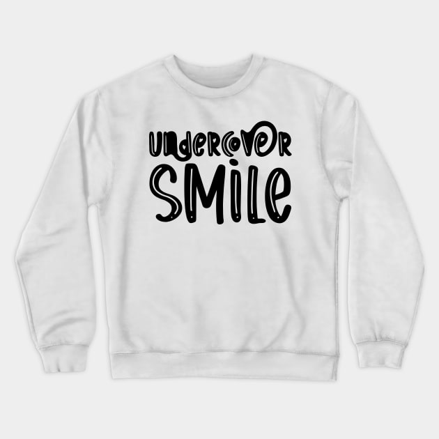 Undercover Smile Crewneck Sweatshirt by TypoSomething